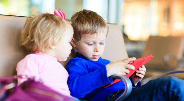 Kids playing on tablet