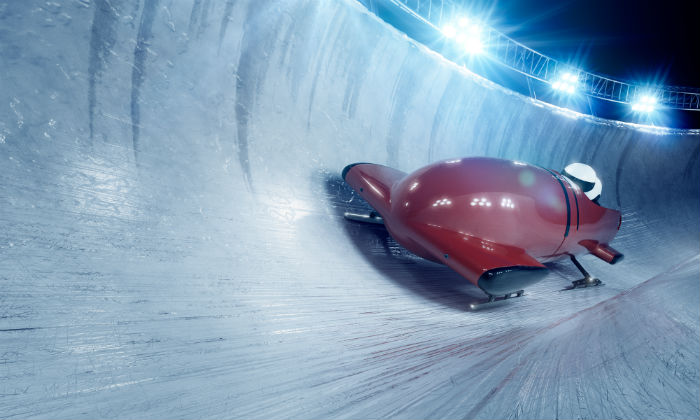 Team Of Bobsleighers On Track